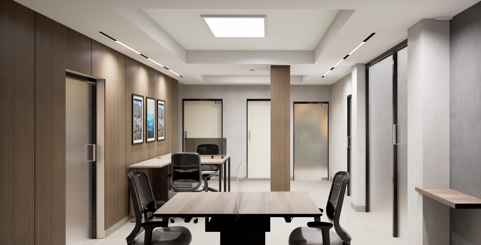 Área de oficinas con estaciones de trabajo por A. Guzman Studio